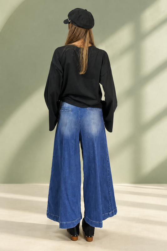 Jeans San Pedro blu, vista posteriore su sfondo verde salvia