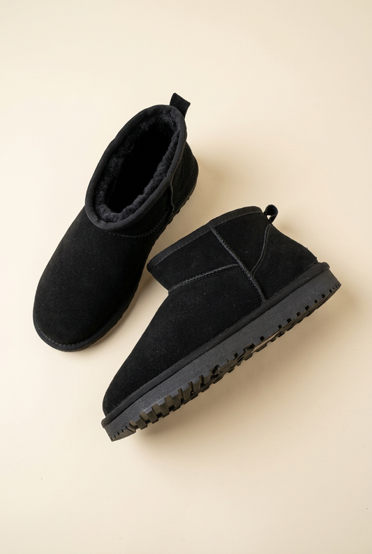 Scarpe 522 nere su sfondo avorio da studio